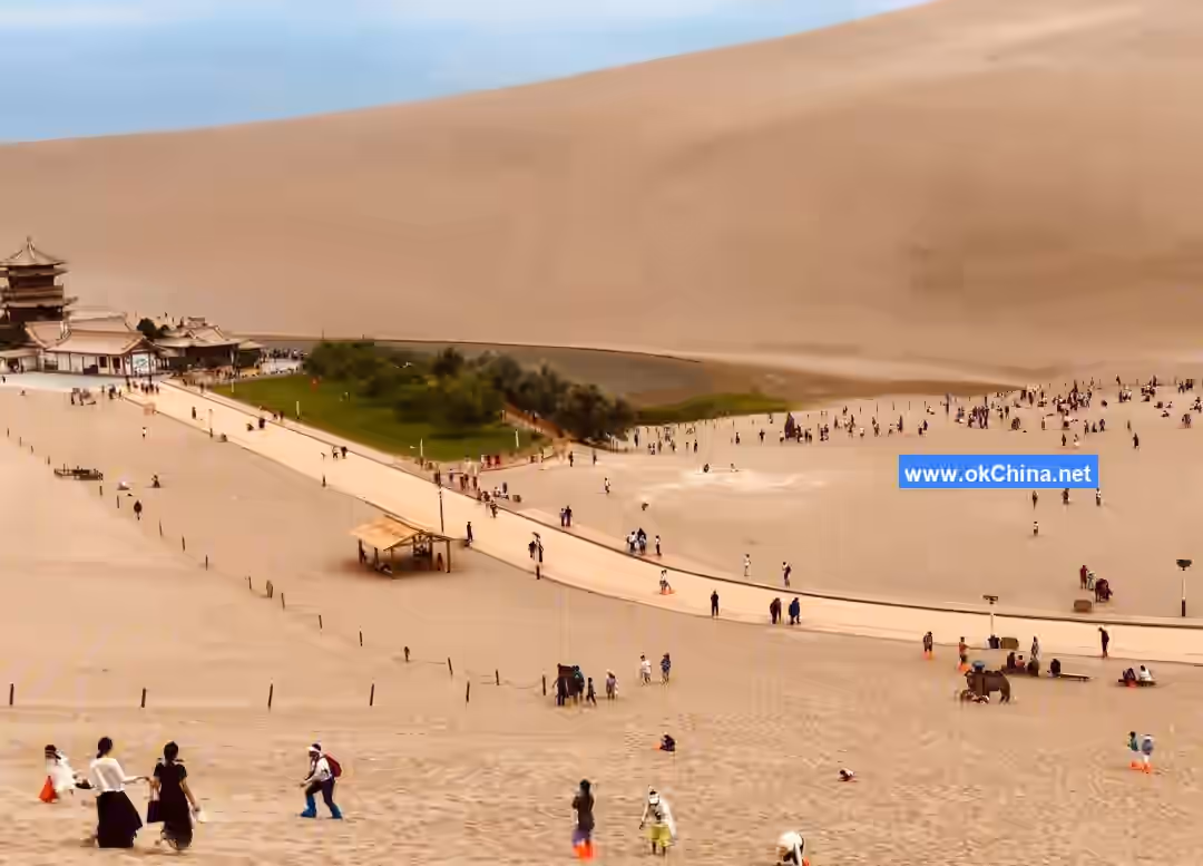 Mingshashan Mountain And Crescent Moon Shaped Spring Scenic Area