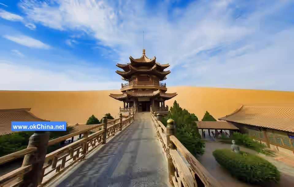 Mingshashan Mountain And Crescent Moon Shaped Spring Scenic Area